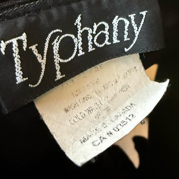 Black satin midi skirt with asymmetrical hem and flared design - Picture 3 of 4